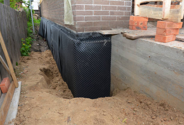 Happy homeowners after waterproofing job in Red Hill